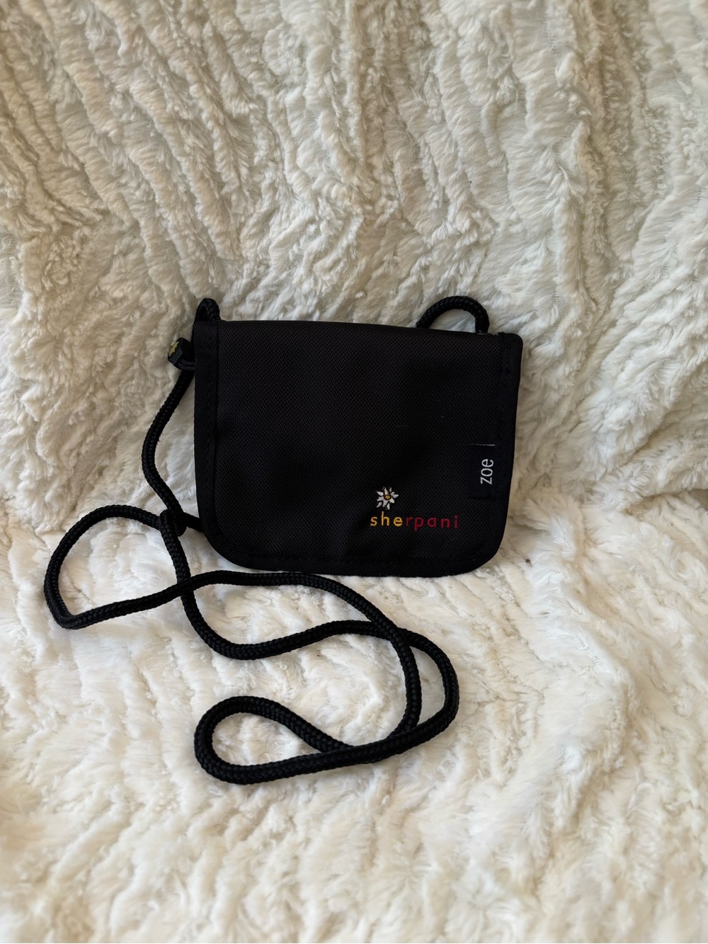 Sherpani black zip around small bag